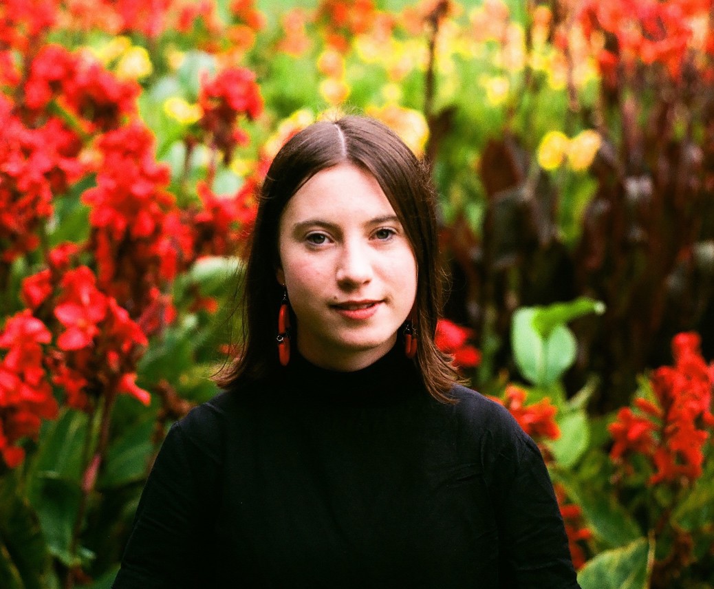 Imogen Cygler in a garden